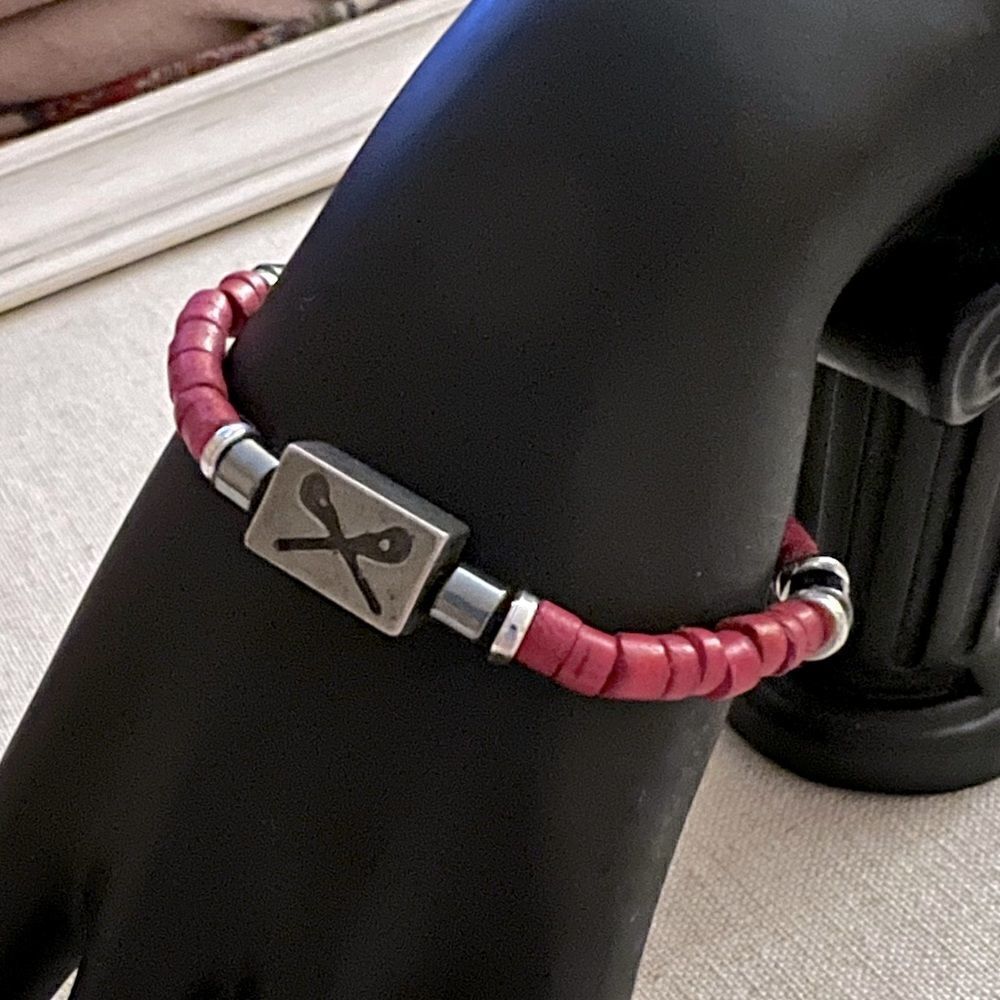 Lacrosse elasticized bracelet w pink wood and silver and pewter beads